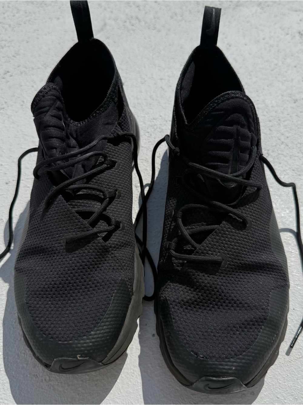 Men's Black Nike Slip-On Sneakers